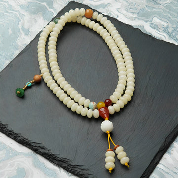 White jade bodhi [wealth from all directions] 6*9mm 108 pieces