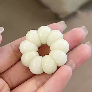 愛らしいミニニンニクとマンゴスチンのハンドヘルドチャーム。複数の色をご用意しています。